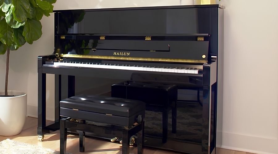 Đặt piano upright cách tường sau 10cm, hai bên 30cm